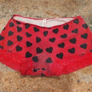 Pink boyshort with lace detail.